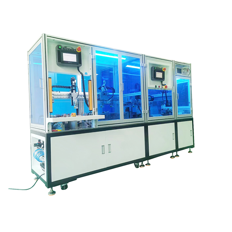 Full-automatic line for trimming, stripping, soldering and mounting of magnetic rings.